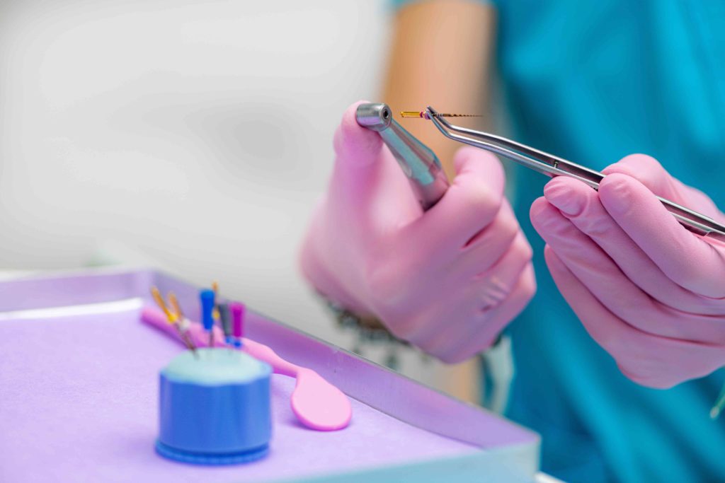 A dentist using tools